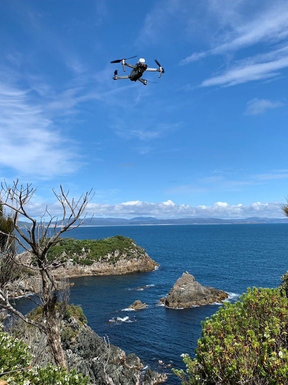 the sperm drone flying over the island